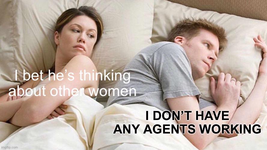 A couple in bed facing opposite directions